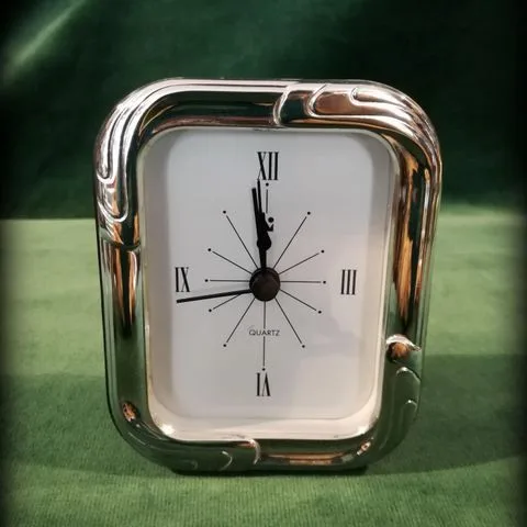 Reloj de Plata de Ley