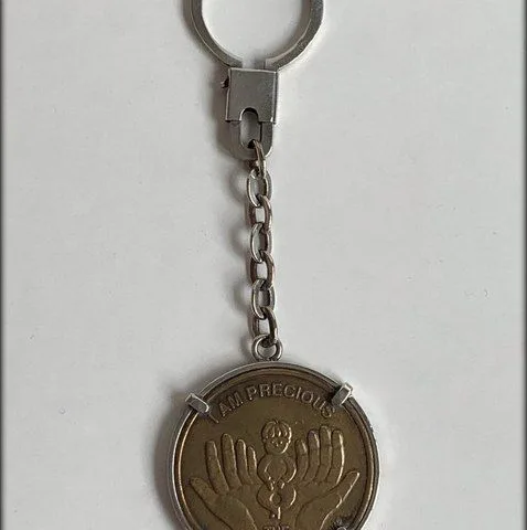 Llavero redondo en Plata y Bronce